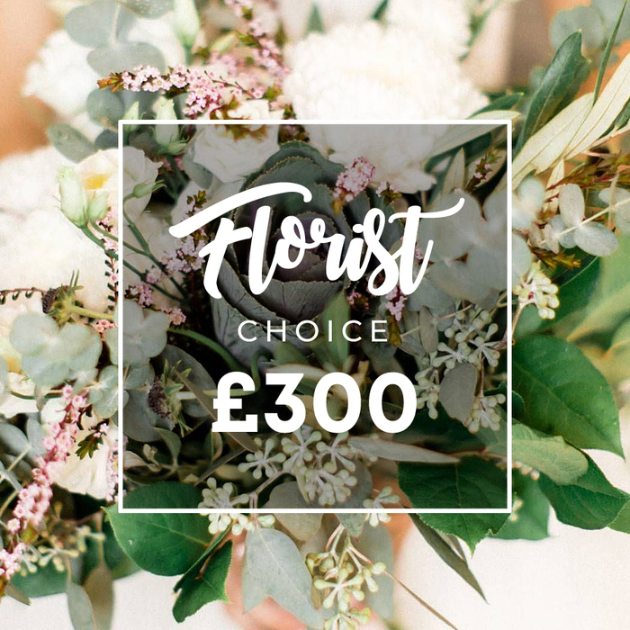 This image tells a little love story in flowers. A Florist Choice bouquet sits under soft light, its palette of white and cream blooms-perhaps garden roses, ranunculus, or peonies-paired with delicate pale pink spray flowers that borrow warmth from the scene. The greens read lush and natural: rounded eucalyptus, slender olive branches, and tiny pale-green berries lend texture and air. A darker center catches the eye-a bold ornamental kale or a sculptural succulent-adding contemporary drama to the classic bouquet. A white rectangular frame hovers over the arrangement, the word Florist written in a graceful script, CHOICE in clean sans-serif, and a prominent ?300 beneath in white. The backdrop blends peach and cream into a soft glow, as if the bouquet were caught in late-day sun. Crafted for special occasions, this piece speaks of thoughtful design and expert curation by a local hand in Queensbury, with delivery across NW9 making it a reliable choice for anniversaries, birthdays, or a heartfelt thank-you to someone cherished.