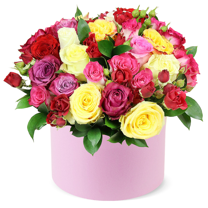 Imagine a couture bouquet: dozens of roses in a soft pastel pink hat box, presented against a pristine white background. The arrangement forms a generous dome of blooms in brilliant yellow, deep red, cheerful fuchsia, delicate light pink, magenta, purple, and ivory, each petal velvety and luminous. The box's satin-matte finish complements the jewel-like hues, while dark green foliage threads through the blossoms, peeking along the rim and heightening the sense of abundance. The roses vary in size-from large, fully opened flowers to tight spray roses and miniature buds-creating a rich tapestry of texture and depth. The composition feels luxurious yet approachable, designed for celebrations of all kinds, from birthdays to anniversaries, to a simple 'thank you.' The image is set on a white background, emphasizing the craft of the florist and the purity of color. In Queensbury, this design is a favourite for premium deliveries to residential streets and local businesses, often chosen for Mother's Day and Valentine's Day, or as a statement gift for a milestone. The piece showcases careful layering and modern elegance, making it suitable for contemporary homes as well as refined interiors. In Queensbury we take care to ensure freshness and timely delivery, so the bouquet arrives with lasting beauty and a smile.