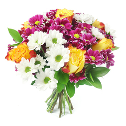 Set against a bright, uncluttered white background, this hand-crafted bouquet radiates colour and texture, forming a generous rounded shape that almost fills the frame. At its centre are striking bi-colour roses, their petals glowing from a sunny, golden yellow heart that gradually deepens into burnt orange and soft reddish tones along the outer edges. These warm, elegant roses are surrounded by crisp white daisy-like chrysanthemums, each bloom featuring a distinctive lime-green central disk that adds a fresh, lively contrast and suggests new beginnings in the Queensbury community. Threaded between the lighter blooms are clusters of deep magenta chrysanthemums, their densely packed petals creating soft mounds of colour with yellow-green centres that harmonise with the daisies. Dark, glossy green foliage is interspersed throughout, framing the flowers and giving the bouquet structure, like the mature trees that line local parks and gardens. The stems are gathered tidily at the base, cleanly cut and tightly bound, revealing the skilled hand of an experienced florist preparing the bouquet for a vase in a Queensbury home or office. Gentle, even lighting brings out the nuances in each petal and leaf, from the velvety rose spirals to the slightly ruffled chrysanthemum edges. The overall impression is one of polished cheerfulness and heartfelt warmth, suitable for congratulating a friend, sending a thoughtful thank-you, or celebrating an anniversary close to Queensbury. The combination of bright yellows, oranges, whites, greens and rich magentas gives the design a versatile, year-round appeal while still feeling special and personal.