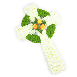 Viewed from slightly above against a crisp white background, this hand-built floral Celtic cross reads as both a sculptural object and a heartfelt memorial. The foundation is a dense blanket of small, snow-white spray chrysanthemums whose compact heads give the cross a soft, almost silken surface that suggests purity and quiet consolation. Placed with intentional rhythm, bright apple-green button chrysanthemums form the circular centre ring and alternate through the arms, their lime-tinged spheres creating a tactile contrast and a visual nod to traditional Celtic knotwork. Nestled at the exact centre, three golden-orange roses open like a small sunrise, their warm petals catching the light and offering a poignant focal point; they are gently framed by darker green fern or foliage, which lends depth and a natural finishing touch. The arrangement's colours - white, green, and orange - subtly evoke the Irish flag and are chosen with sensitivity for families marking Irish roots or faith. The lighting is soft and directional, clarifying petal texture and the three-dimensional shape without harsh shadow, while a faint floral scent of chrysanthemum and rose might be imagined. As a florist serving Queensbury, Queensbury station and the surrounding streets toward Wembley and Kingsbury, I would recommend this cross for funeral services, graveside tributes, or church displays where an emblem of remembrance and cultural reverence is desired. Prepared with meticulous technique, it reads as a composed, dignified expression of condolence from a local hand at Flower Delivery Queensbury.