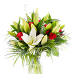 A radiant studio photograph of a tall, elegantly composed bouquet in a clear cylindrical glass vase, captured against a clean white background so every colour and texture reads distinctly. At the visual heart sits a single, large oriental white lily in full bloom - its creamy satin petals gently curved back to reveal pale yellow stamens and a fresh green pistil, the bloom poised slightly forward as the focal note. Around it, numerous lily buds in lime-green and soft pale-yellow sit tightly furled or just beginning to open, suggesting movement and the promise of more flowers yet to unfold. Scattered through the arrangement are velvety red rosebuds and compact small roses, their deep crimson petals still mostly curled inward, offering concentrated flashes of passionate red against the lighter lily tones. The flowers are set into a generous framework of foliage: broad, dark forest-green lily leaves give weight and structure; longer, feathery palm-like fronds in a brighter emerald arc outward to create a sense of sweep and breath; and rounded, silvery-green eucalyptus sprigs add a cool, muted contrast and subtle texture. Through the transparent vase, crisp pale green stems are visible immersed in clear water, reinforcing the bouquet's freshness. The overall impression is refined and emotional - a composition that balances purity and ardour, quiet promise and bold colour. The scent, imagined from the image, would be a clean, powdery lily note softened by the rose's deeper perfume. This arrangement reads as a thoughtful gift or elegant centrepiece for celebrations, anniversaries, and intimate moments in and around Queensbury and nearby Kingsbury.