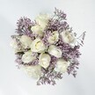 A vision of serene grace, this bouquet blends luxurious creamy white roses with a gentle mist of lavender statice, reminiscent of a peaceful morning in Queensbury's leafy avenues. Each rose is full and velvety, its petals opening gracefully to reveal a luminous centre, while the delicate clusters of statice weave around them like the softest drifting clouds. The complimentary textures-the satiny smoothness of the roses, the crisp paperiness of the lavender statice blooms-combine to create a tableau that feels both inviting and soothing. Under natural daylight, the bouquet glows with a sense of hopefulness, making it ideal for celebrating new beginnings at a local Queensbury wedding or marking cherished milestones with quiet elegance. The subtle fragrance, part floral, part gently herbal, drifts through the space, evoking peaceful walks through nearby parks and the comforting hush of a cherished home. Each element is chosen and arranged with the practiced hand and caring eye of a Queensbury florist, ensuring that the bouquet not only uplifts the spirit but also expresses lasting affection-whether gifted as a romantic gesture, a heartfelt thank you, or a gesture of solace to someone close in this vibrant northwest London neighbourhood.