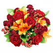 Seen from directly above against a crisp white background, this classic round bouquet reads as a warm, celebratory statement of colour and texture. At its heart are large, fully opened deep-red roses with velvety petals that fold back to reveal their intricate, shadowed centres; around them cluster smaller, jewel-toned burgundy spray roses whose tight, layered blooms add depth and a soft, plush surface. Bright orange Asiatic lilies punctuate the composition with trumpet-shaped blooms and visible stamens, some fiery and fully unfurled, others caught mid-unfurl as promising buds - the contrast between open form and taut bud gives the bouquet a sense of movement. Glossy red hypericum berries gleam like tiny rubies threaded through the greenery, offering playful highlights and a tactile, round counterpoint to the roses' velour. Broad, glossy ruscus or salal leaves peek between the flowers, lending fresh, calming green and boosting the arrangement's volume and silhouette. The light is soft and even, picked out from above to emphasize petal textures and the warm palette of red, orange and green without harsh shadows. As a local Queensbury florist might say, this bouquet suits anniversaries, heartfelt celebrations, or a romantic gesture delivered across Queensbury and neighbouring Kingsbury or Colindale. You can almost scent the heady sweetness of roses mingled with the lily's bright, spicy green note; the overall impression is one of opulent warmth, carefully composed to read beautifully in photos and to sit happily on a mantel or dining table as a statement of love and comfort.