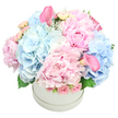 This pastel-soft bouquet reads like a gentle lullaby, a poetry of petals that glows in the softest light. Pale blue hydrangeas puff beside frilled pink peonies, their layered blooms catching the eye with depth and a velvet hint. Sprigs of cream and blush spray roses thread through, while two blush-pink calla lilies rise with sculptural grace, each trumpet shape guiding the eye through the dome. The blooms are cradled in a round white hat box, its clean, modern edge letting the flowers speak for themselves. A delicate perfume lingers-the creamy sweetness of peony blending with cool hydrangea-evoking quiet mornings along Queensbury's streets. The overall mood is tranquil yet hopeful, a thoughtful gesture for birthdays, new arrivals, or a moment of comfort shared with a neighbour. You can sense the care behind every placement, as this piece balances luxury with everyday friendliness, a refined expression that fits both contemporary homes and special occasions. Crafted for the Queensbury community, this bouquet carries a sense of local artistry-from Burnt Oak to Colindale and beyond-delivering a whisper of romance and calm to any room. It is the kind of gift that feels both generous and intimate, suitable as a centerpiece, a thoughtful surprise, or a cheerfully elegant note to mark a joyful day.