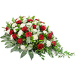A carefully crafted sympathy arrangement stretches horizontally across a clean white background, its shape fuller and more substantial on the left before tapering into a gentle, trailing finish on the right, like a soft exhale of goodbye. The central focus is on deep red roses, their velvety petals rich and layered, spaced thoughtfully throughout the spray so that each bloom feels intentional, conveying profound love and respect. Around and between the roses, white carnations open in full, ruffled heads, their snowy petals creating a light, cushion-like texture that lifts the darker tones and symbolises purity and peaceful rest. The flowers are cradled in an abundant bed of greenery: broad, dark green leaves provide a firm, reliable base, while muted, silvery-green eucalyptus leaves are scattered through the design, bringing depth, texture, and a subtle hint of cool fragrance. On the right-hand side, slender streams of delicate green foliage trail outward, softening the edges and adding a sense of natural, unforced grace, as if the arrangement has been gently placed rather than rigidly constructed. The balanced trio of red, white, and green gives the spray a timeless, respectful character, entirely in keeping with the quiet streets and family-led services around Queensbury. It is easy to picture this piece being delivered to a local funeral home or chapel, where its classic beauty would offer comfort to mourners gathered to say their last goodbye. Every element feels considered, from the placement of each rose to the way the greenery frames the blooms, creating a tribute that honours memory with calm, understated elegance.