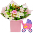 Against a bright white background, a joyful new baby girl floral arrangement is shown in full detail, as if ready to head out for same-day delivery across Queensbury. The central focus is a lush bouquet rising from a tall, square light pink gift box, its clean lines softened by layers of pastel pink tissue and transparent cellophane that gently fan out around the stems. The flowers above form a rounded, generously filled dome. In the very centre, a vivid pink gerbera daisy sits like a smiling face, surrounded by snowy white chrysanthemums and delicate Alstroemeria lilies with petals shaded in soft blush and cream, lightly freckled in deeper pink. Tall creamy yellow lily buds give height and a sense of unfolding life. Bright lime-green button blooms peek through the arrangement, providing a playful contrast, while clusters of deep red Hypericum berries add a rich, warm depth of colour. The bouquet is laced with varied greenery, from broad glossy leaves to fine fern fronds, creating a layered, textured frame reminiscent of the well-tended gardens around Kingsbury Circle and the streets leading towards Queensbury. To the right, a shiny foil balloon shaped like a traditional baby pram completes the celebratory theme. Its body gleams in vibrant hot pink, topped with a contrasting purple hood, and supported by purple wheels patterned with multicoloured spokes, almost like a child's toy. Bold yellow and green lettering on the side reads It's a Girl!, accompanied by small pink heart motifs. Together, flowers and balloon create a tender, exuberant tribute to a newborn daughter, perfectly suited to brighten a nursery, hospital room, or family home in Queensbury.